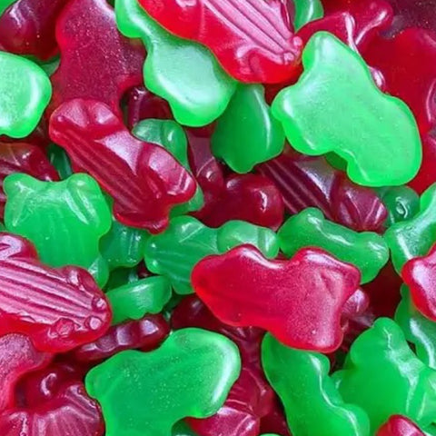 red and green gummy candies shaped like frogs.