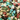 A variety of colorful chocolate rocks coated in a candy shell.